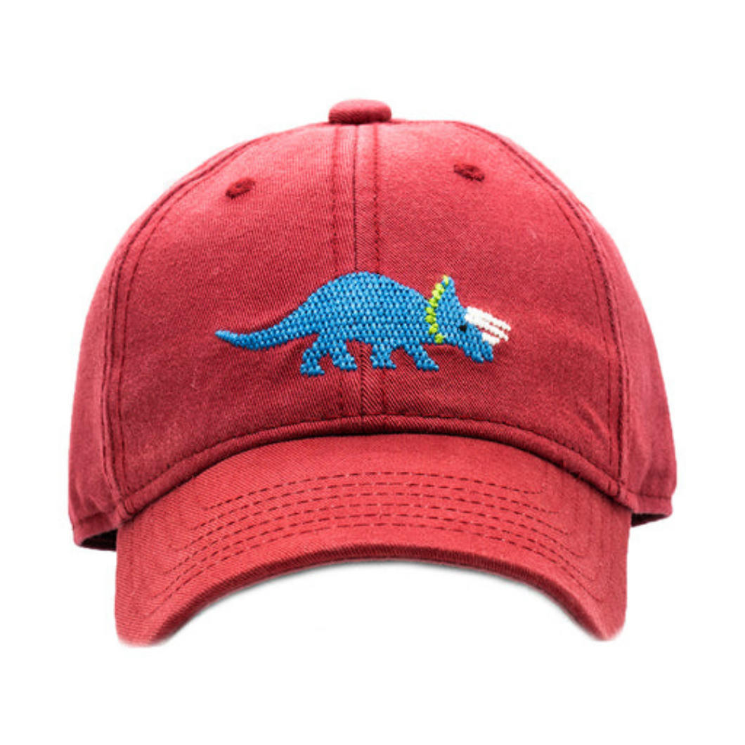 Baseball Cap Triceratops on Weathered Red
